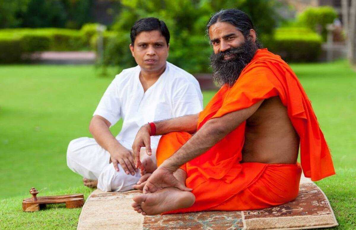 Acharya Balkrishna with Yoga Guru Baba Ramdev 